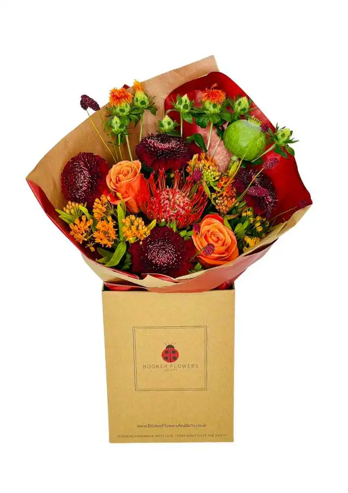 Autumn Harvest Delight hand tied bouquet in water