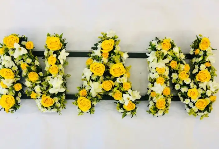 NAN Funeral Flowers in Yellow and White