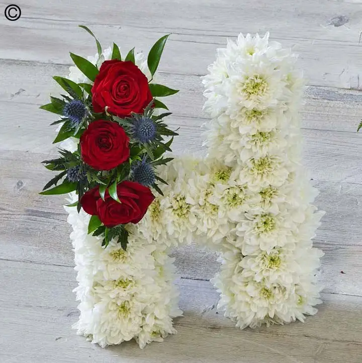 Tribute Letter - Massed Red Spray Tribute Letter - Massed Red Spray